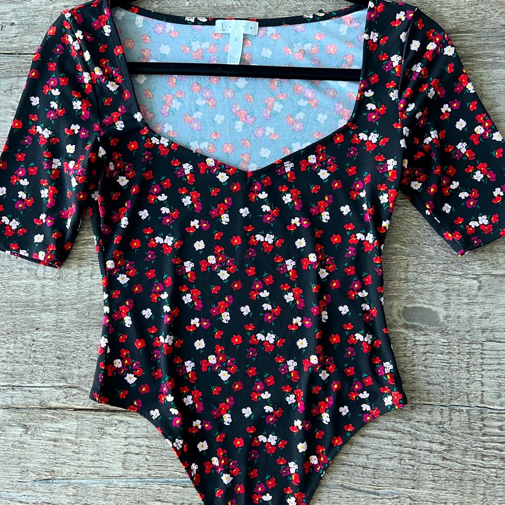 Body suit with floral design